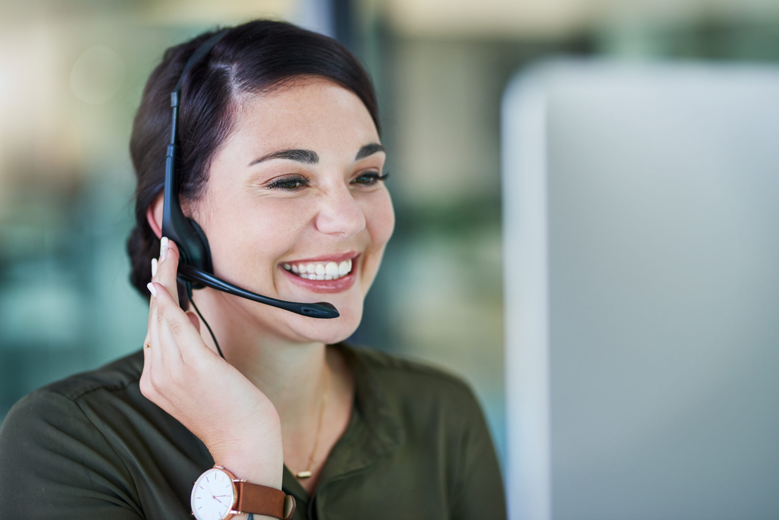 Customer service representative answering a phone